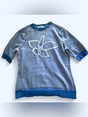Light Blue Short-Sleeve Sweater with White Floral Motif